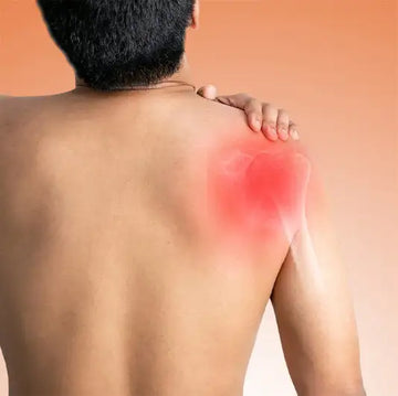 A man’s shoulder with a red highlighted area indicating pain or inflammation.