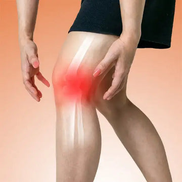 A woman’s knee highlighted with a glowing red area to indicate pain or inflammation.