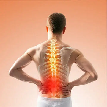 A glowing yellow and red spine overlay on a man’s back, highlighting the lumbar region.